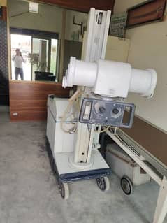 A. M. X 4 pls x ray machine good condition and good working 0