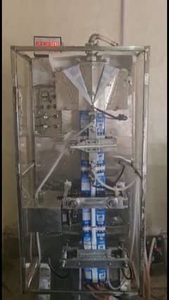 MILK PACKING MACHINE