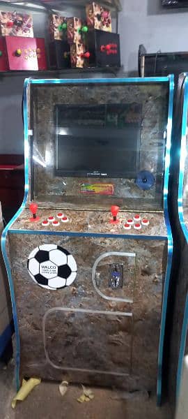 Arcade video game foosball football token game 2