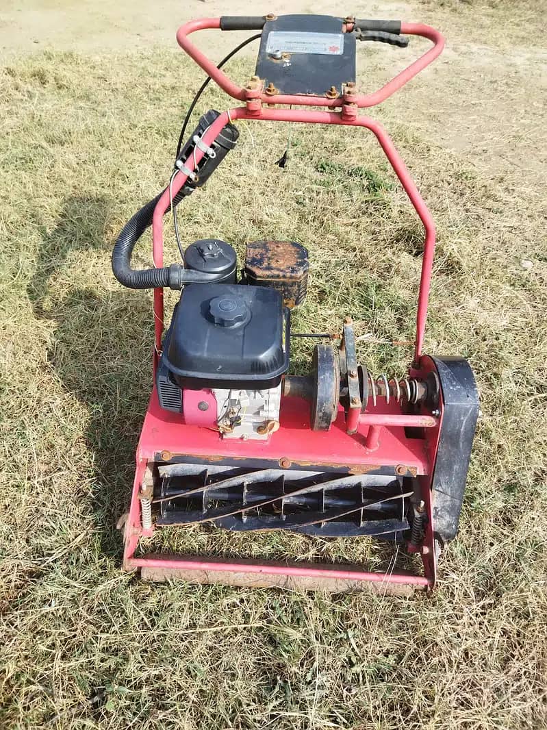 Grass cutter/lawn mower - Gardening machine 0
