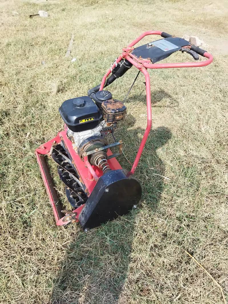 Grass cutter/lawn mower - Gardening machine 1