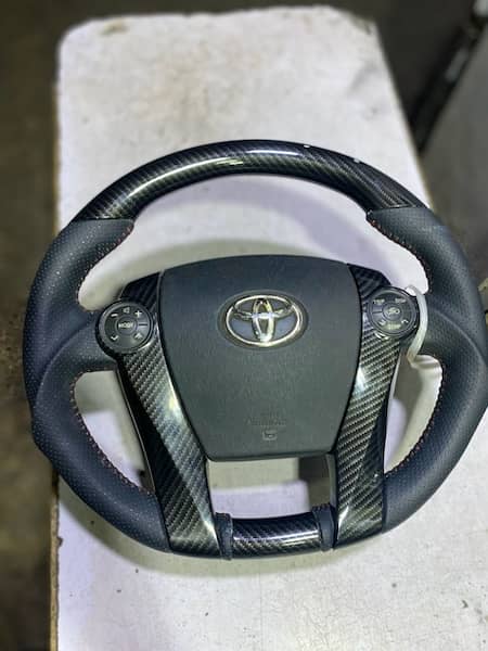 aqua + prius sports multimedia steering 1