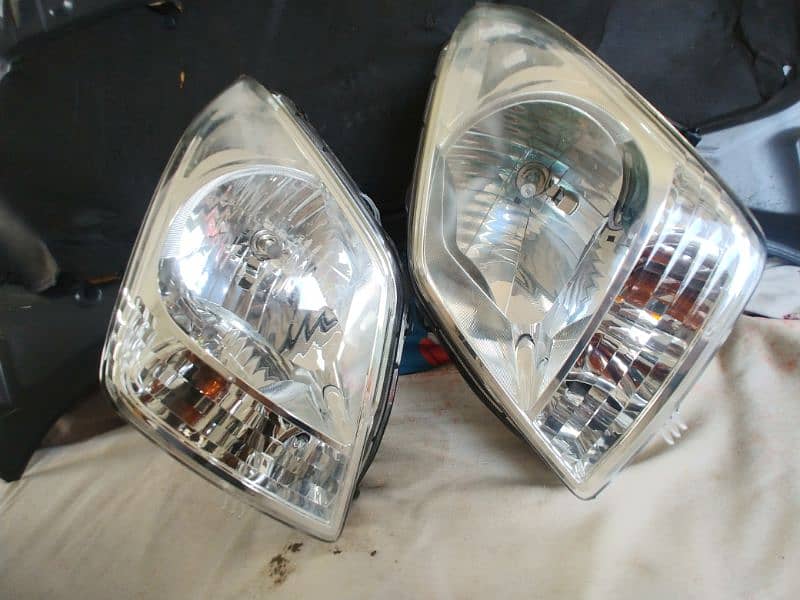 Suzuki wegon r and stingray japanese headlights 14000. 3