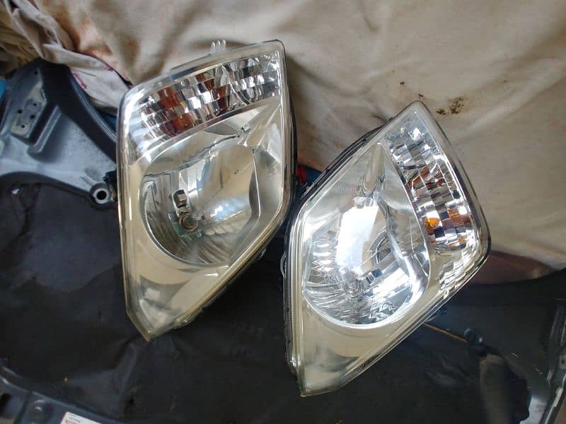 Suzuki wegon r and stingray japanese headlights 14000. 4