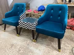 pair of chairs and coffee table