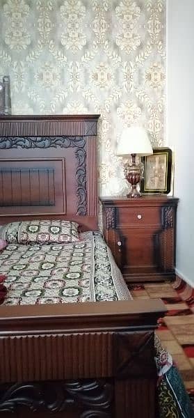 beautiful bed   2 side table 1 showcase and 1 most attractive dressing