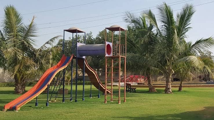 Play ground swings and roof parking shade. 4