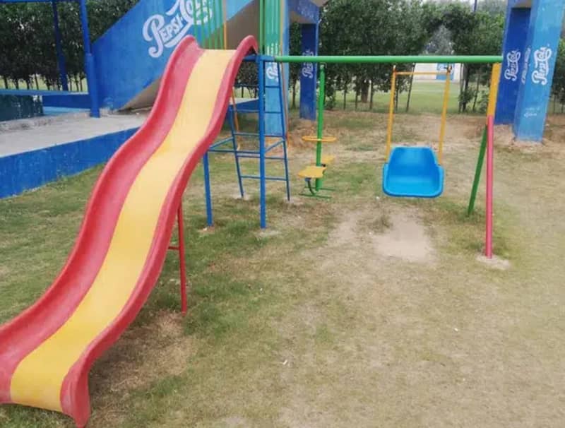 Play ground swings and roof parking shade. 6