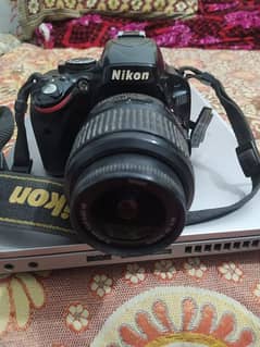 Nikon D5100 with kit lens 18-55mm for urgent sale