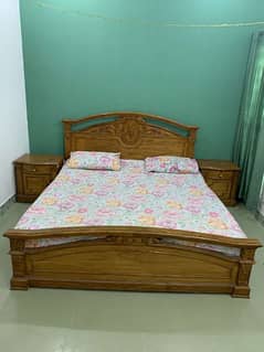 Wooden double bed with 2 side tables