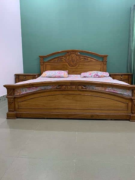 Wooden double bed with 2 side tables 1