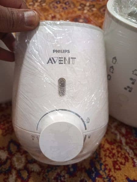 tommee tippee and avent feeder warmer a 5