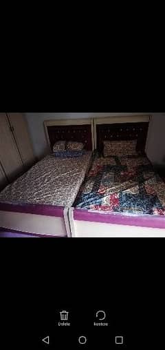 single beds and side table pink and creame colour