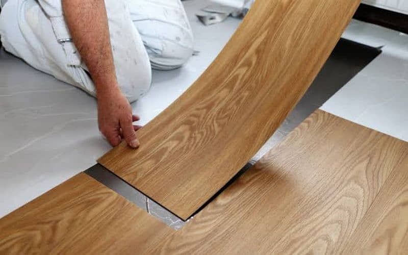 PVC Vinyl flooring, Laminated wooden floor, Artificial Grass. 0