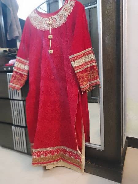 fancy three piece suit in red colour. . 2