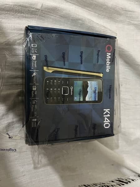 brand new q mobile k140 model only some days used complete box 7