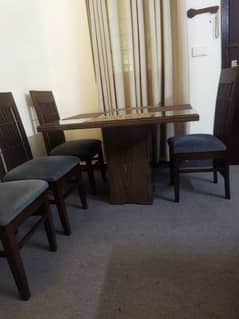 Selling a four chair table set 0