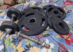 Pair of 10,5 and 2.5 Kg Plates and Two 8 Kg dumbells