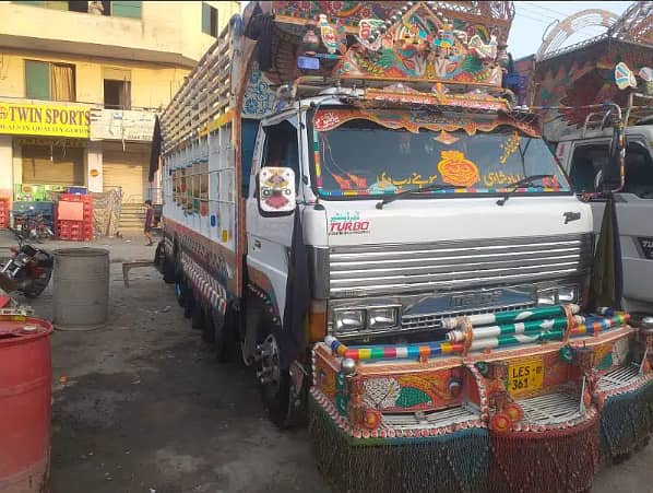 Loader truck with labour container,mazda, shehzore ,pickup for rent 1