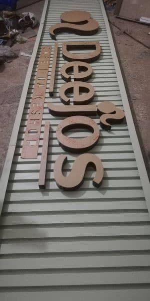 Acrylic sign board. Steel letters. Panaflex printing Neon signs 8