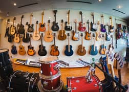 Guitars | Ukuleles | Violins |  Cajon box Musical Instruments