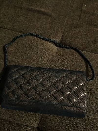 Marks&Spencer(Canada) pre loved bronze clutch barely used