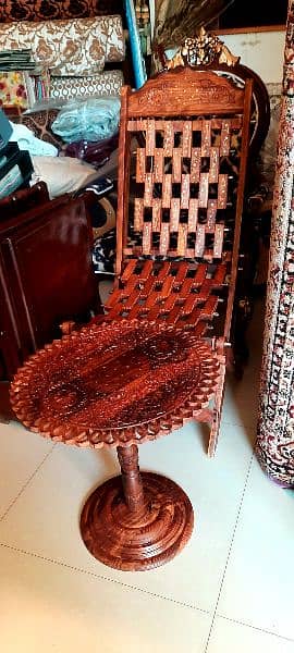 pair of 2 wooden relaxing chairs with 1 table 3