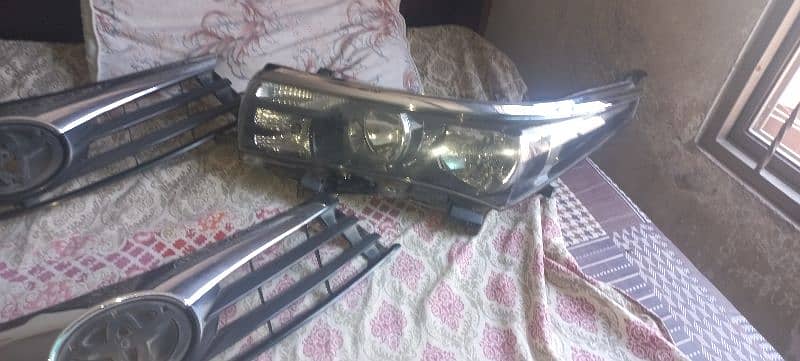 Corolla gli headlight & grill bumper 7