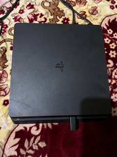 1 TB PS4 SLIM and 4 Games