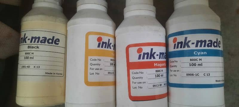 4 colors of printer ink . 2