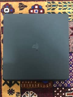 PS4 1TB, including its accessories.