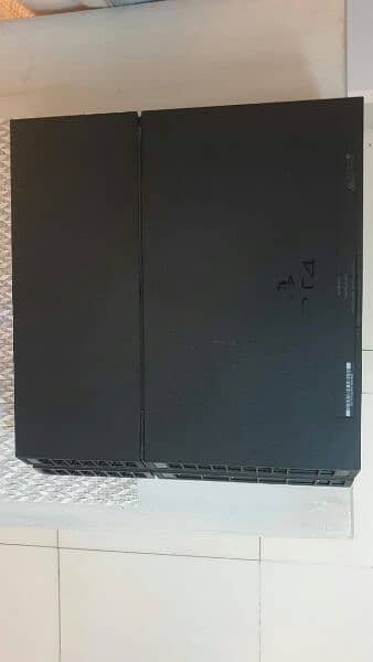 PS4 Fat 1TB 1100 series with 1 game 1