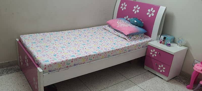 single bed with side table 1