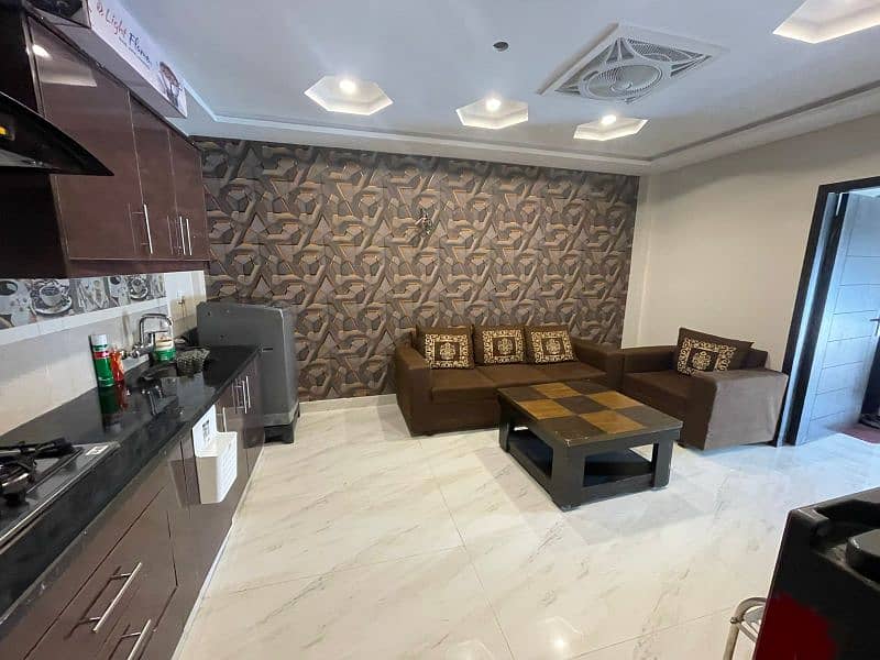 studio apartment full furnished available in bahria town lhr 2