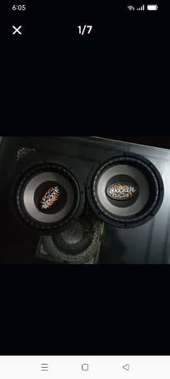 Pair of kicker woofers and an amplifier 0