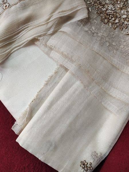 Off white khaadi net embroided dress. 4