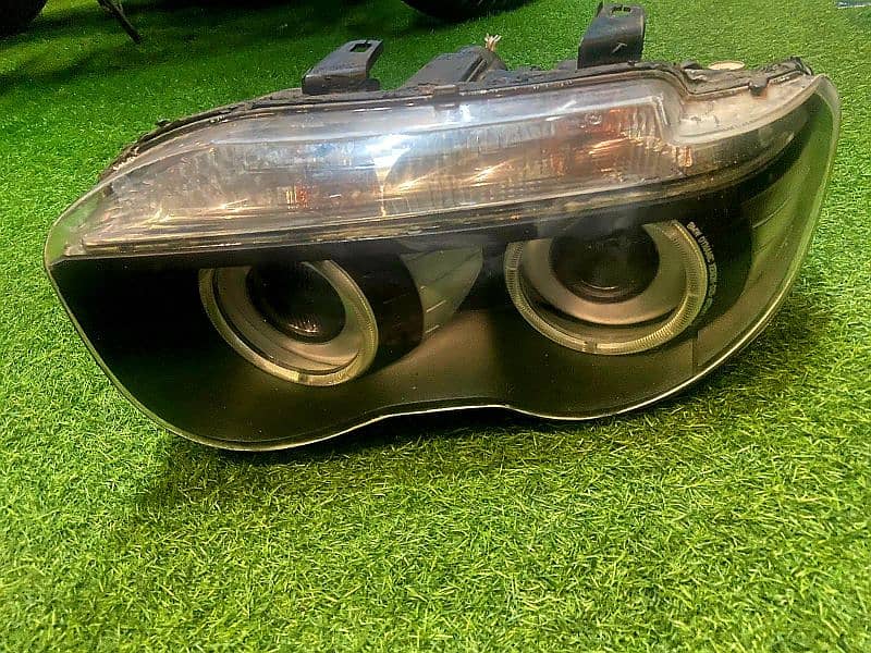 BMW 7 series headlights in 100% new condition !! 8