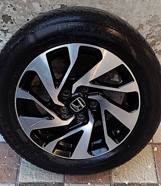 original Honda civic X alloy rims and tyre 0