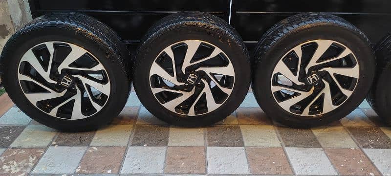 original Honda civic X alloy rims and tyre 1