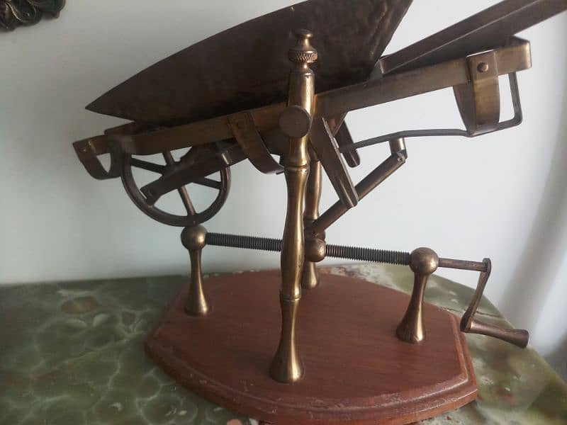 Antique brass wheel barrow show piece. 2