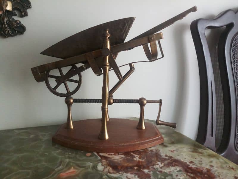Antique brass wheel barrow show piece. 4