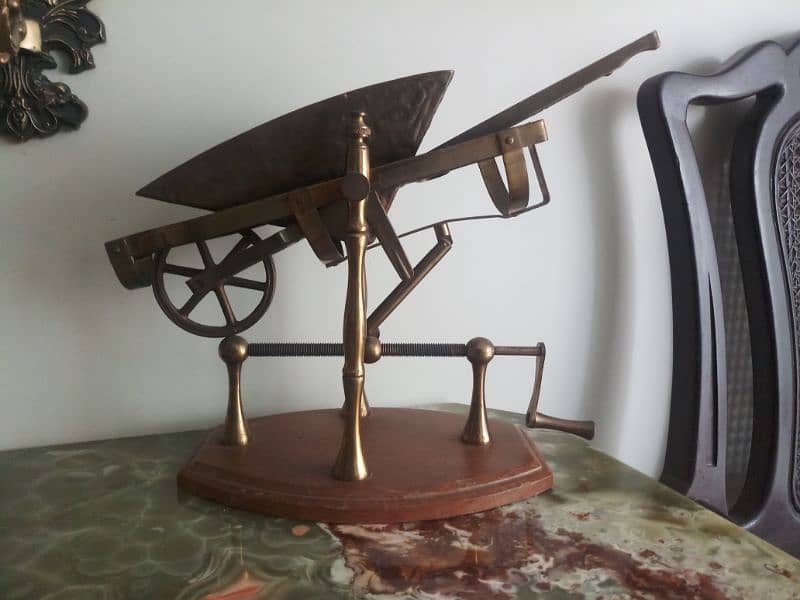 Antique brass wheel barrow show piece. 9