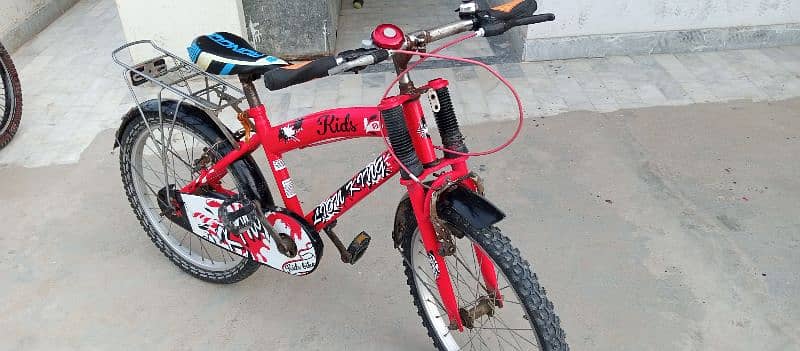 halfords lion king bike