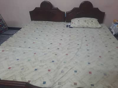 2 Single beds + 2 side tables for sale