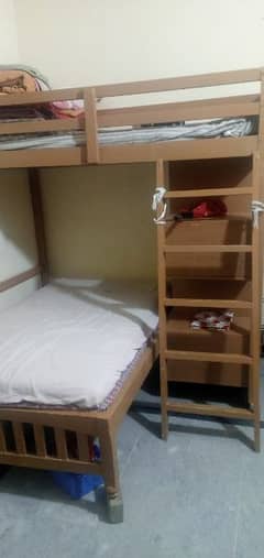 Bunk bed for sell pure wooden with 6 drawrs and book shelves