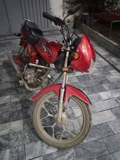 united 100 cc self start red color