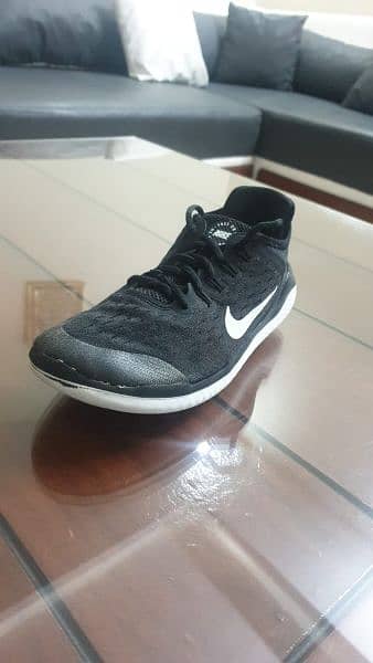 Nike free runner shoes for kids in good condition 0