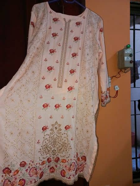 lawn embroided nd simple brand dresses 1