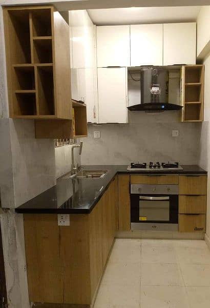 kitchen cabinet and granite 10