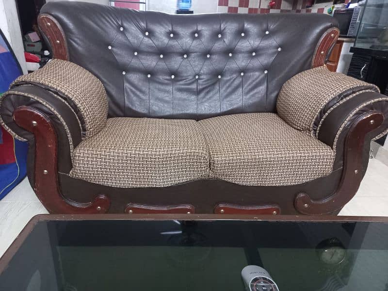 seven seater sofa set with central wooden glass table 2
